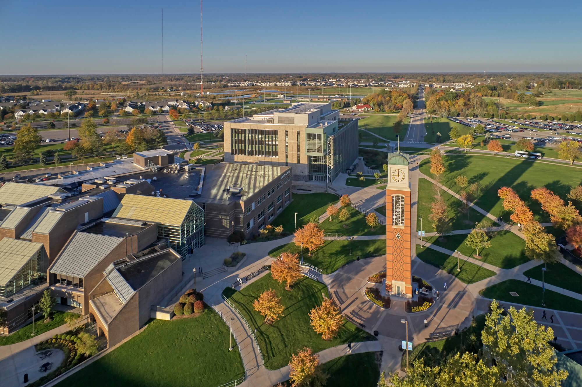 An aerial picture of the Allendale campus including Kirkhof Center, the clock-tower and the library.